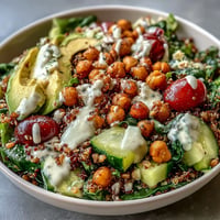 Vibrant Ancient Grains Bowl with farro, quinoa, and chickpeas, ready for lunch.